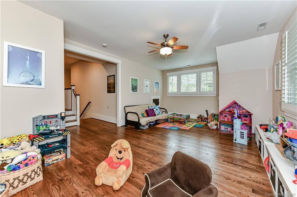 4935 Sharon View Road Charlotte, NC 28226 - Photo 43 of 48 a living room with furniture and a wooden floor