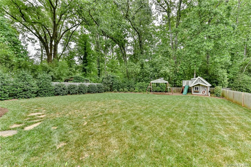 4935 Sharon View Road Charlotte, NC 28226 - Photo 45 of 48 a house is sitting in middle of forest