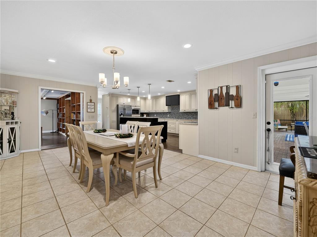 4615 Kings Point Court Lakeland, FL 33813 - Photo 14 of 41 a view of a dining room with furniture