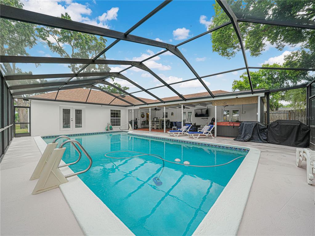4615 Kings Point Court Lakeland, FL 33813 - Photo 35 of 41 a view of a house with swimming pool