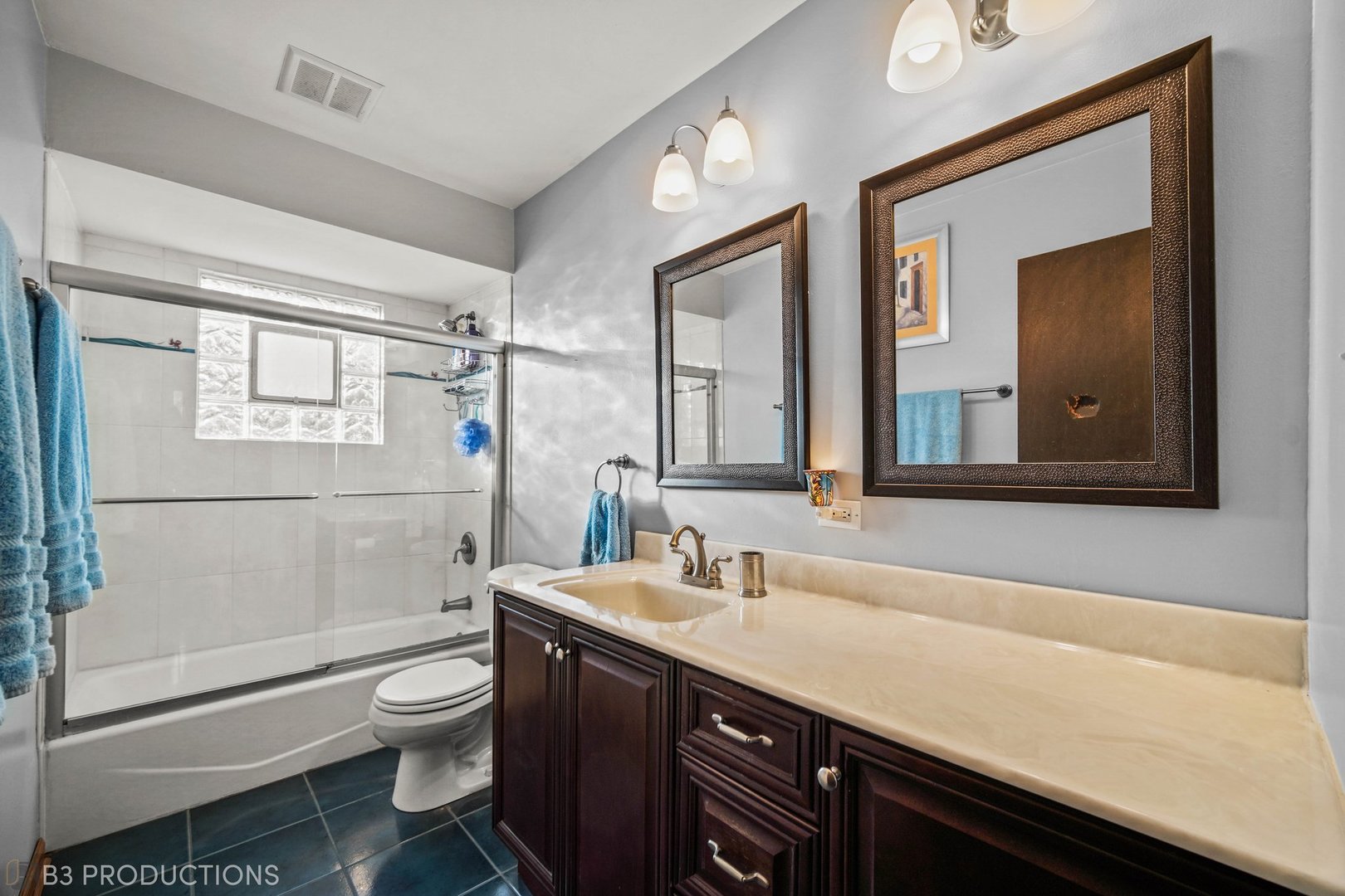 15548 Long Avenue Oak Forest, IL 60452 - Photo 12 of 15 a bathroom with a sink a toilet and shower