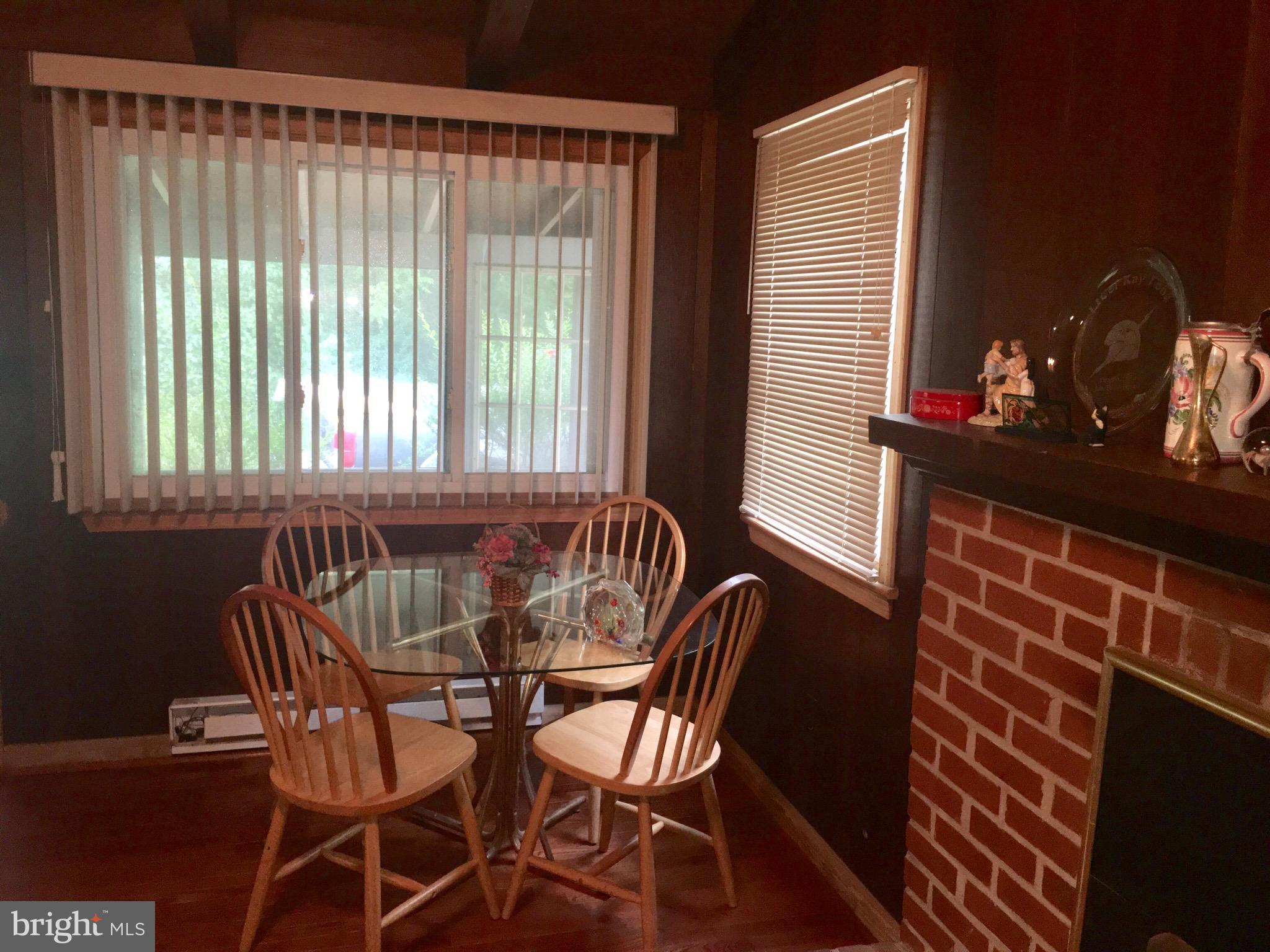 3609 Howellsville Road Front Royal, VA 22630 - Photo 5 of 18 a view of a dining room with furniture and window