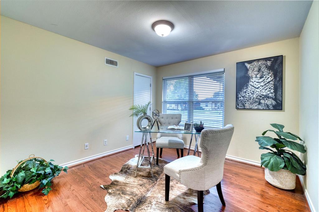 314 Easton Road Dallas, TX 75218 - Photo 21 of 26 a view of a livingroom with furniture and a potted plant