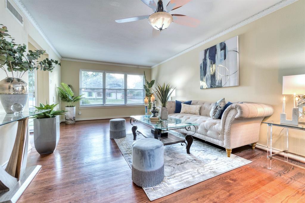 314 Easton Road Dallas, TX 75218 - Photo 6 of 26 a living room with furniture and a large window