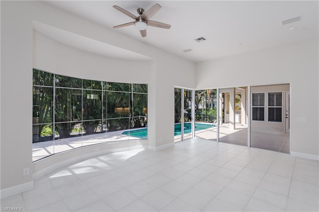 2280 Hawks Ridge Loop Naples, FL 34105 - Photo 13 of 33 View of swimming pool with ceiling fan