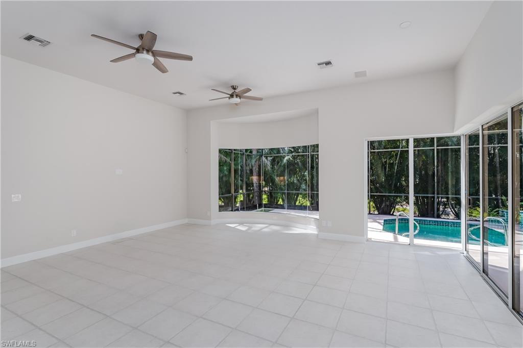 2280 Hawks Ridge Loop Naples, FL 34105 - Photo 14 of 33 View of unfurnished living room