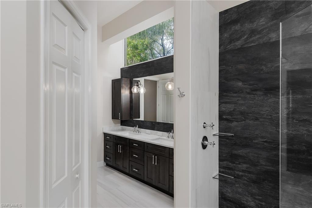 2280 Hawks Ridge Loop Naples, FL 34105 - Photo 20 of 33 Bathroom featuring vanity