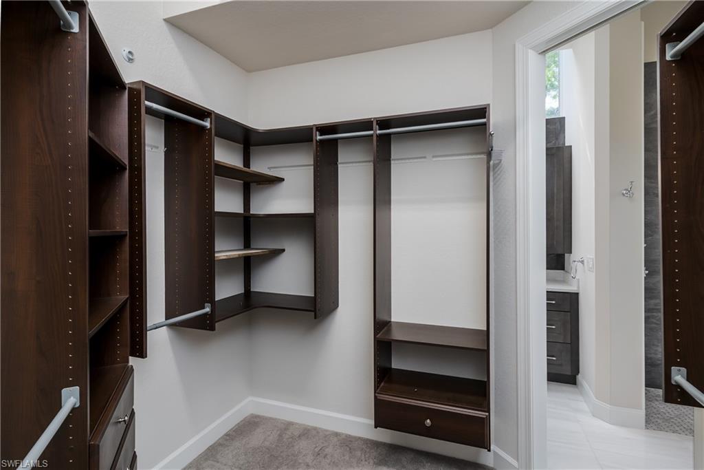 2280 Hawks Ridge Loop Naples, FL 34105 - Photo 23 of 33 View of walk in closet