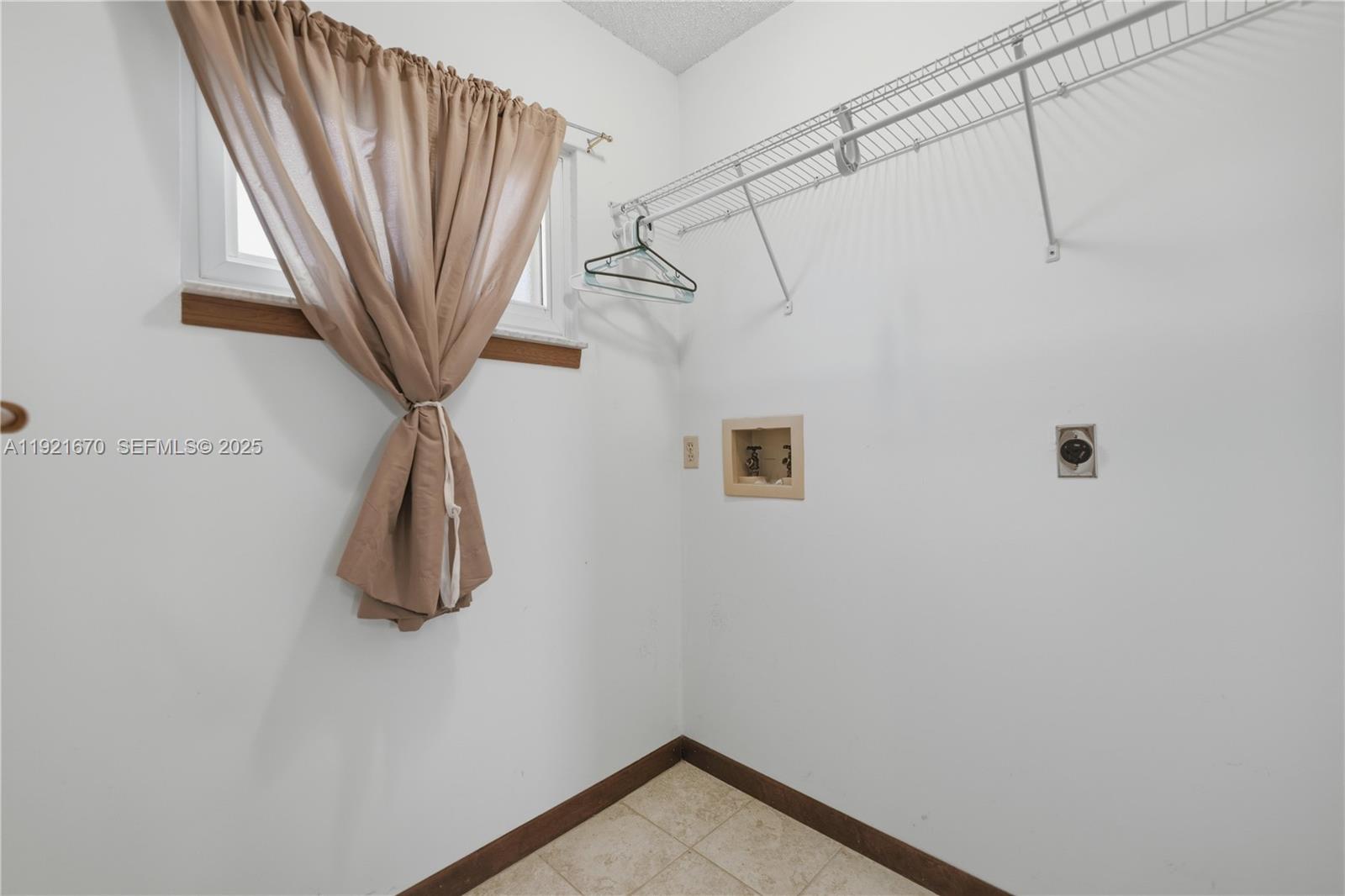 9230 Southwest 101st Place Ocala, FL 34481 - Photo 11 of 30 a bathroom with a shower and a shower curtain