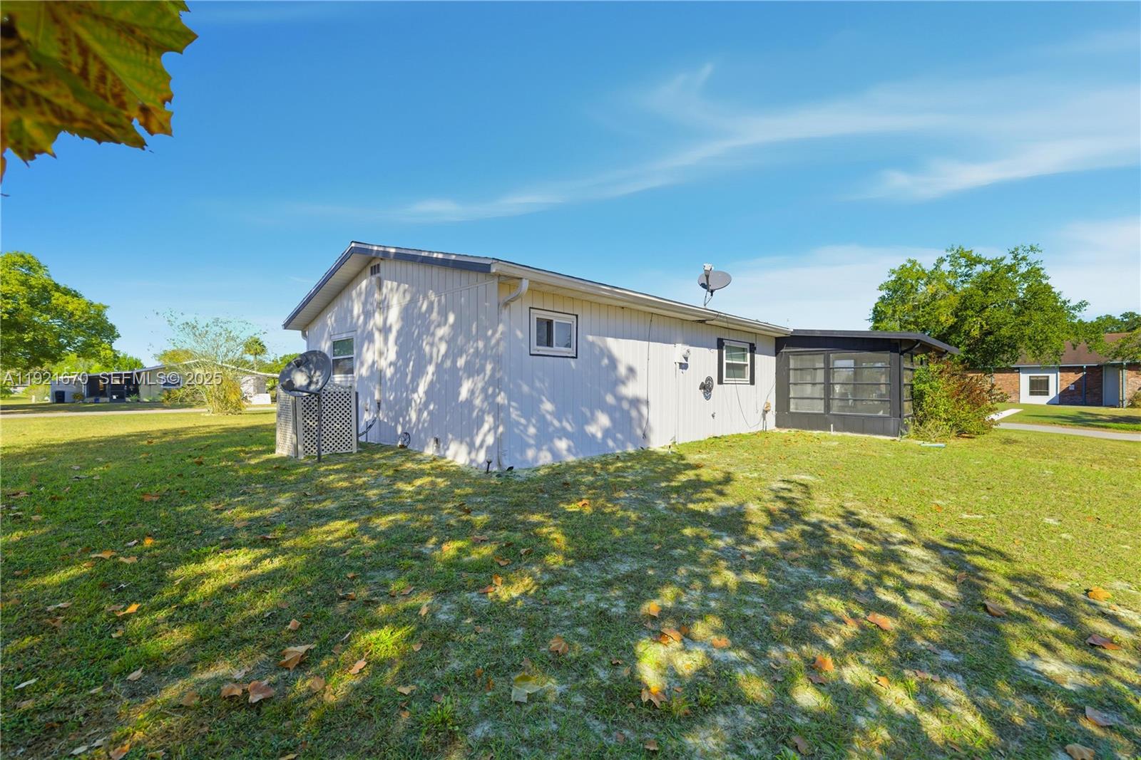 9230 Southwest 101st Place Ocala, FL 34481 - Photo 19 of 30 a front view of a house with garden