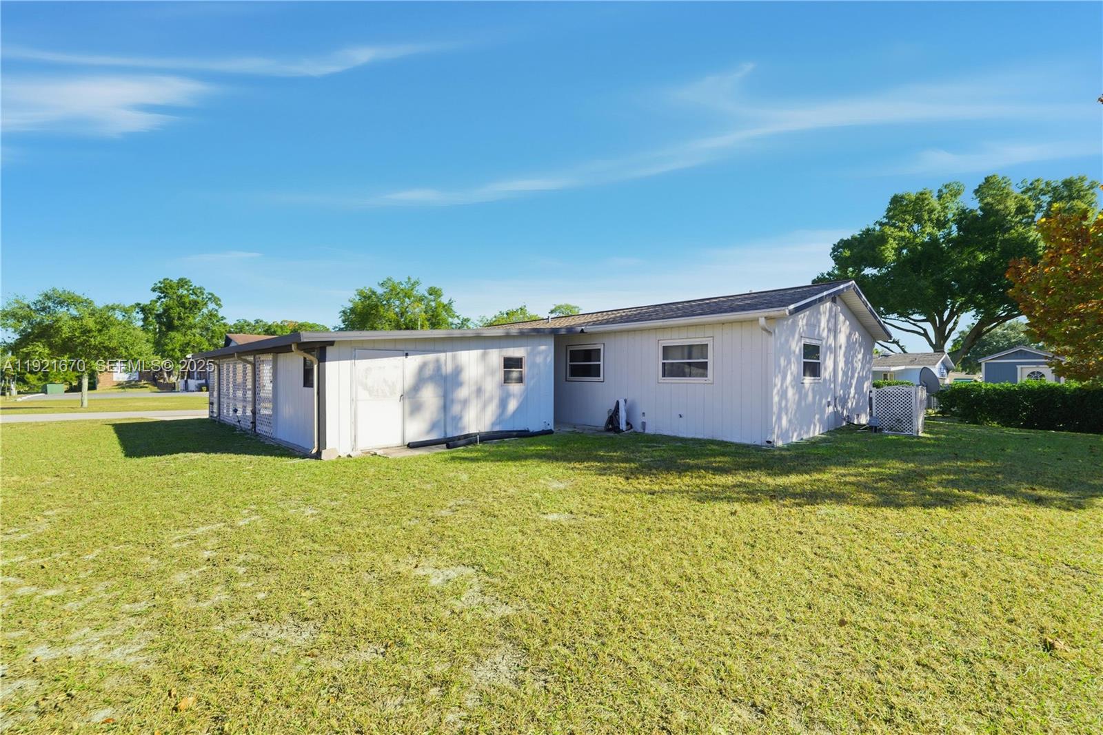 9230 Southwest 101st Place Ocala, FL 34481 - Photo 20 of 30 a view of a house with backyard
