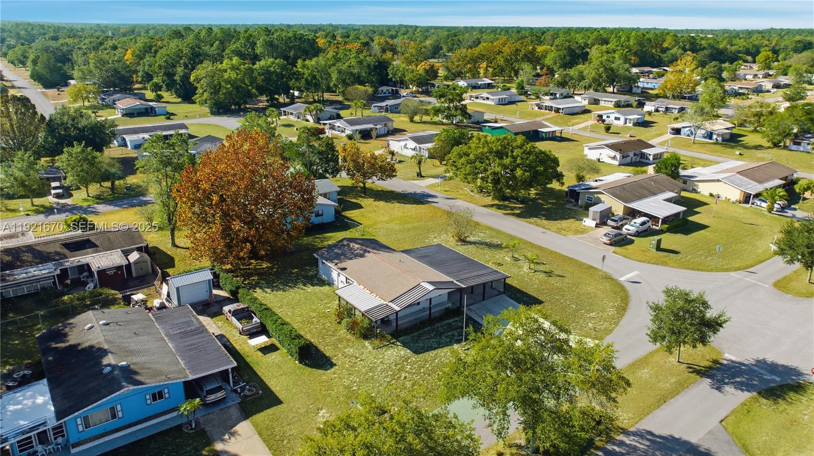 9230 Southwest 101st Place Ocala, FL 34481 - Photo 23 of 30 an aerial view of residential houses with outdoor space