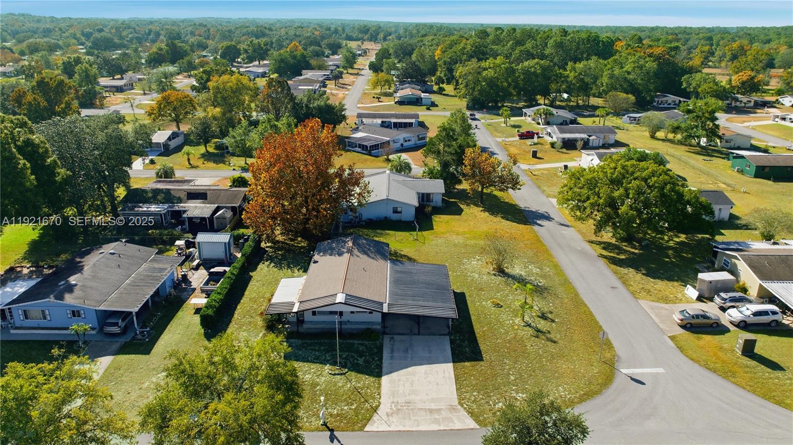 9230 Southwest 101st Place Ocala, FL 34481 - Photo 24 of 30 an aerial view of residential houses with outdoor space