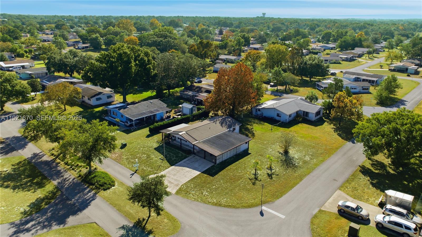 9230 Southwest 101st Place Ocala, FL 34481 - Photo 25 of 30 an aerial view of a house with a garden