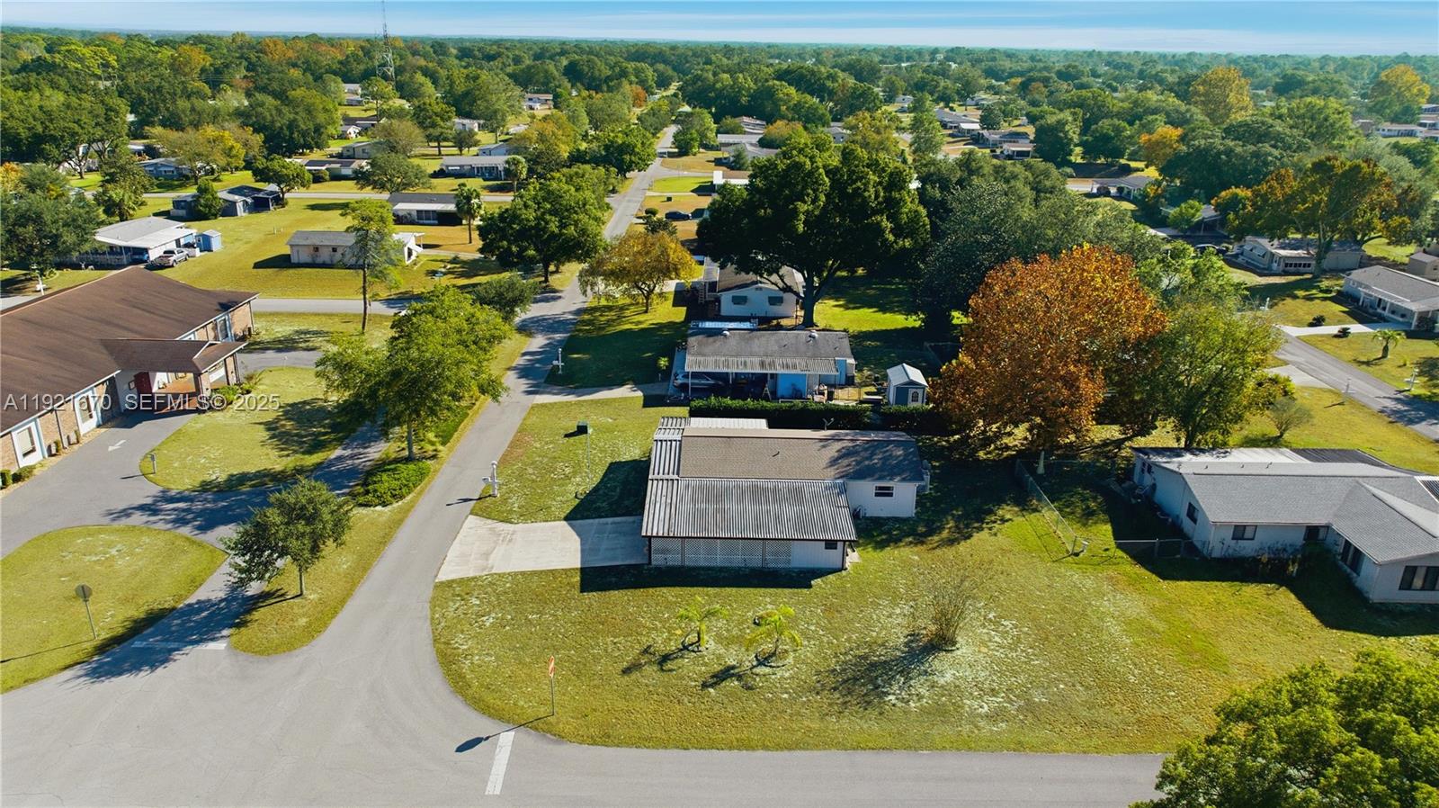 9230 Southwest 101st Place Ocala, FL 34481 - Photo 26 of 30 an aerial view of a house with a swimming pool outdoor seating and yard