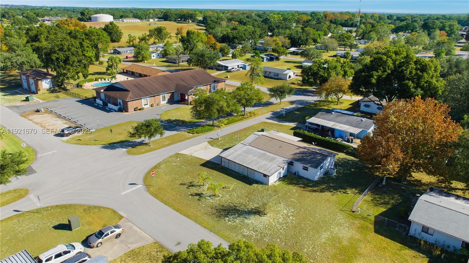 9230 Southwest 101st Place Ocala, FL 34481 - Photo 27 of 30 an aerial view of residential houses with outdoor space and swimming pool