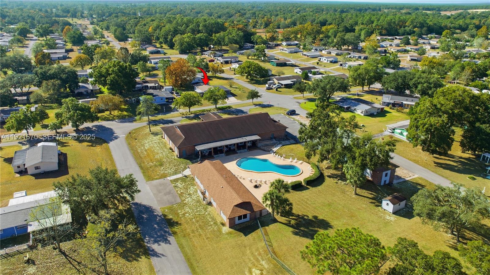 9230 Southwest 101st Place Ocala, FL 34481 - Photo 30 of 30 an aerial view of a house with a yard