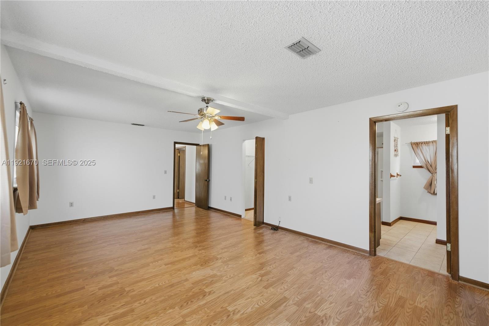 9230 Southwest 101st Place Ocala, FL 34481 - Photo 8 of 30 wooden floor in an empty room