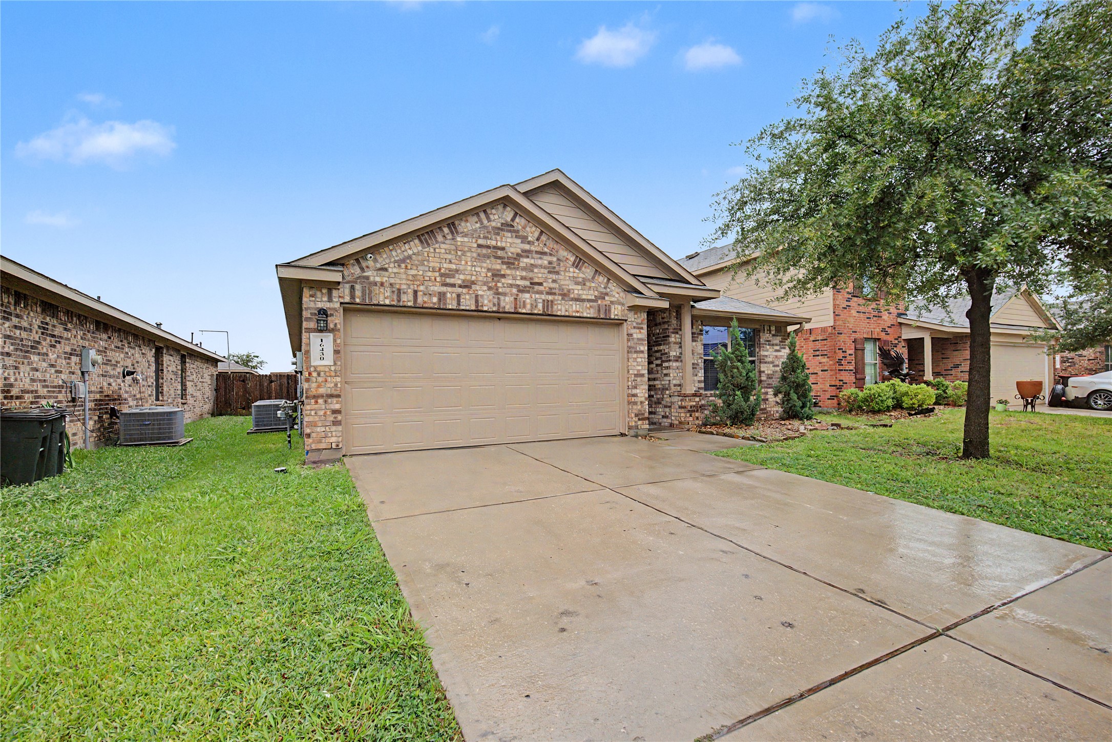 16430 Rodeo River Road Houston, TX 77049 - Photo 2 of 34 a view of a house with a yard
