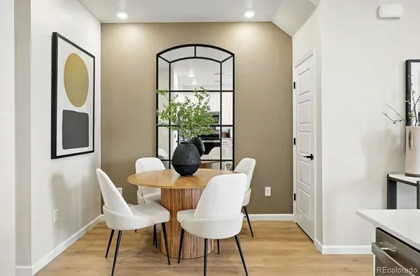 a living room with fireplace furniture and a flat screen tv