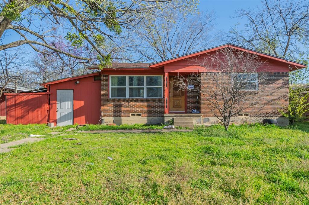 1433 Elms Road Irving, TX 75060 - Photo 1 of 1 View of front of home with brick siding and a front yard