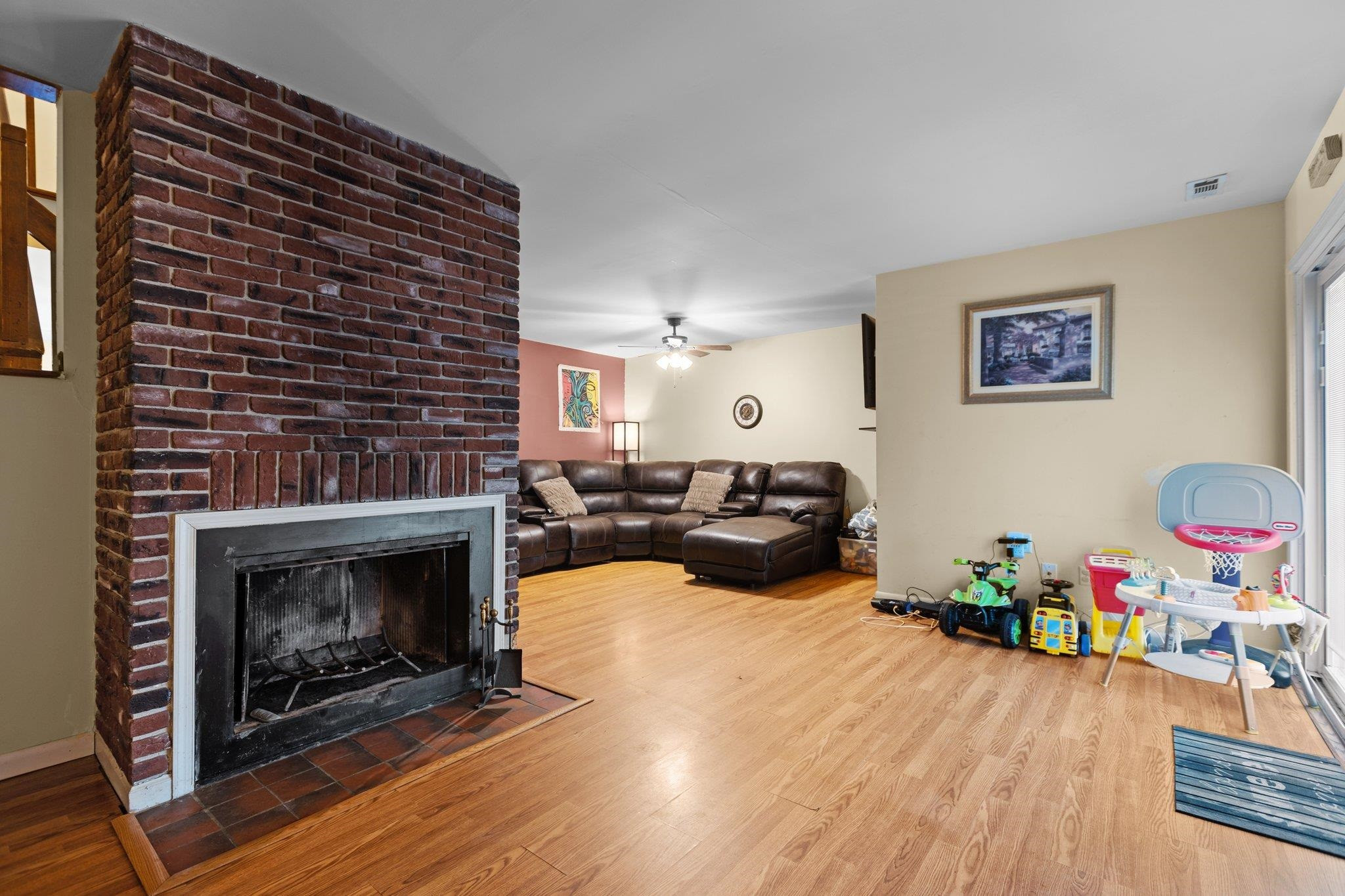 1227 Seaton Road, Unit 34 Durham, NC 27713 - Photo 11 of 32 a living room with furniture and a fireplace