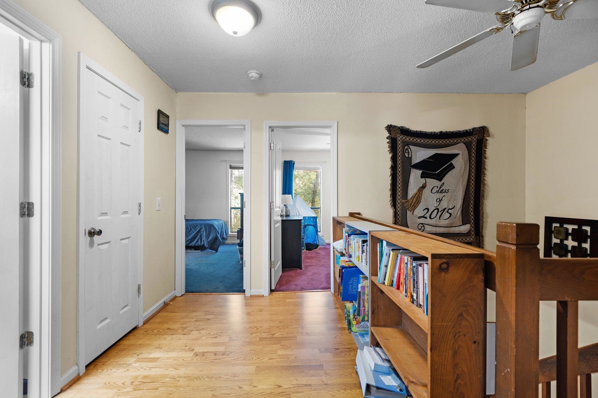 1227 Seaton Road, Unit 34 Durham, NC 27713 - Photo 19 of 32 a view of a hallway with wooden floor and windows