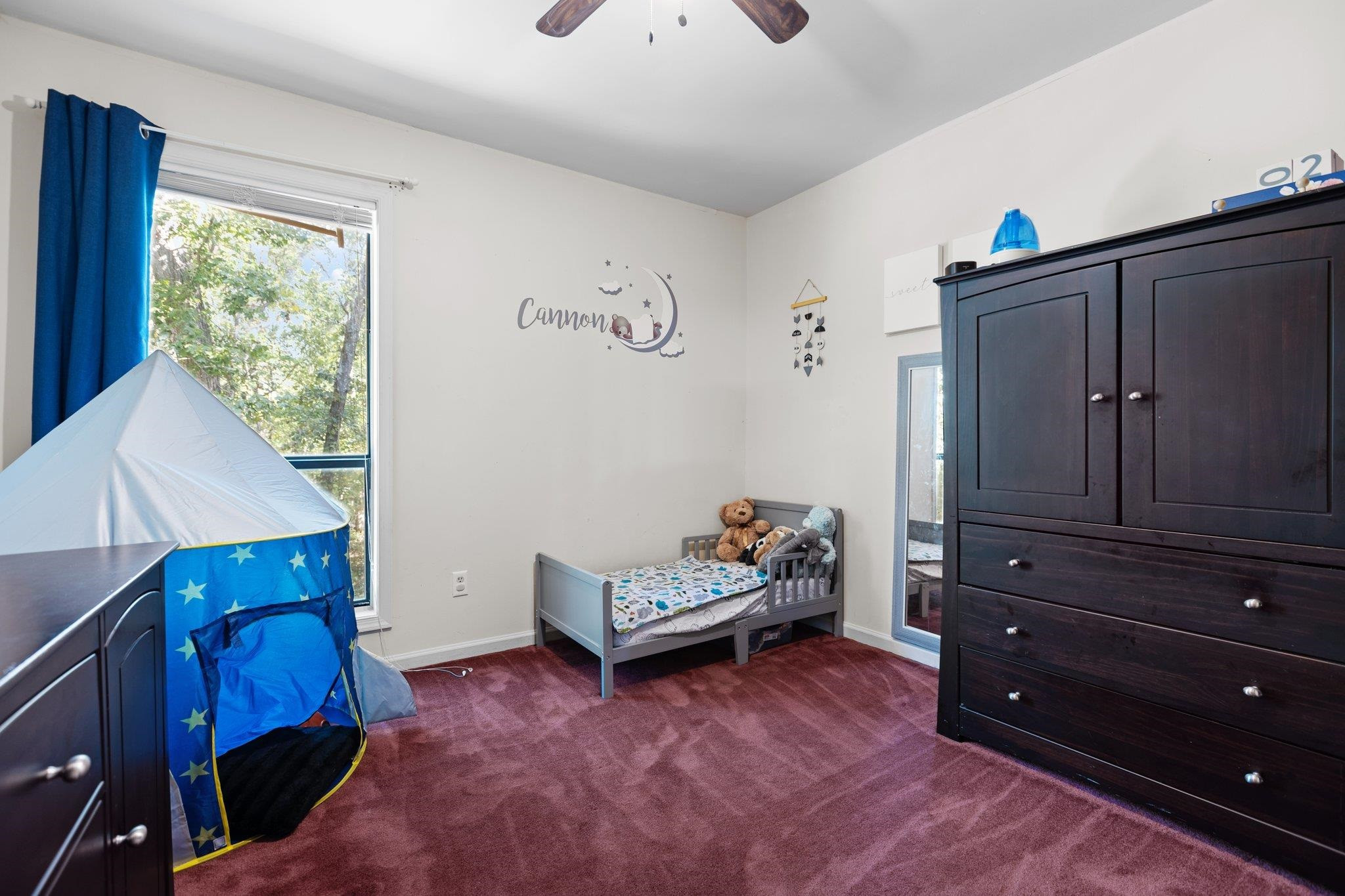 1227 Seaton Road, Unit 34 Durham, NC 27713 - Photo 24 of 32 a living room with furniture and a window