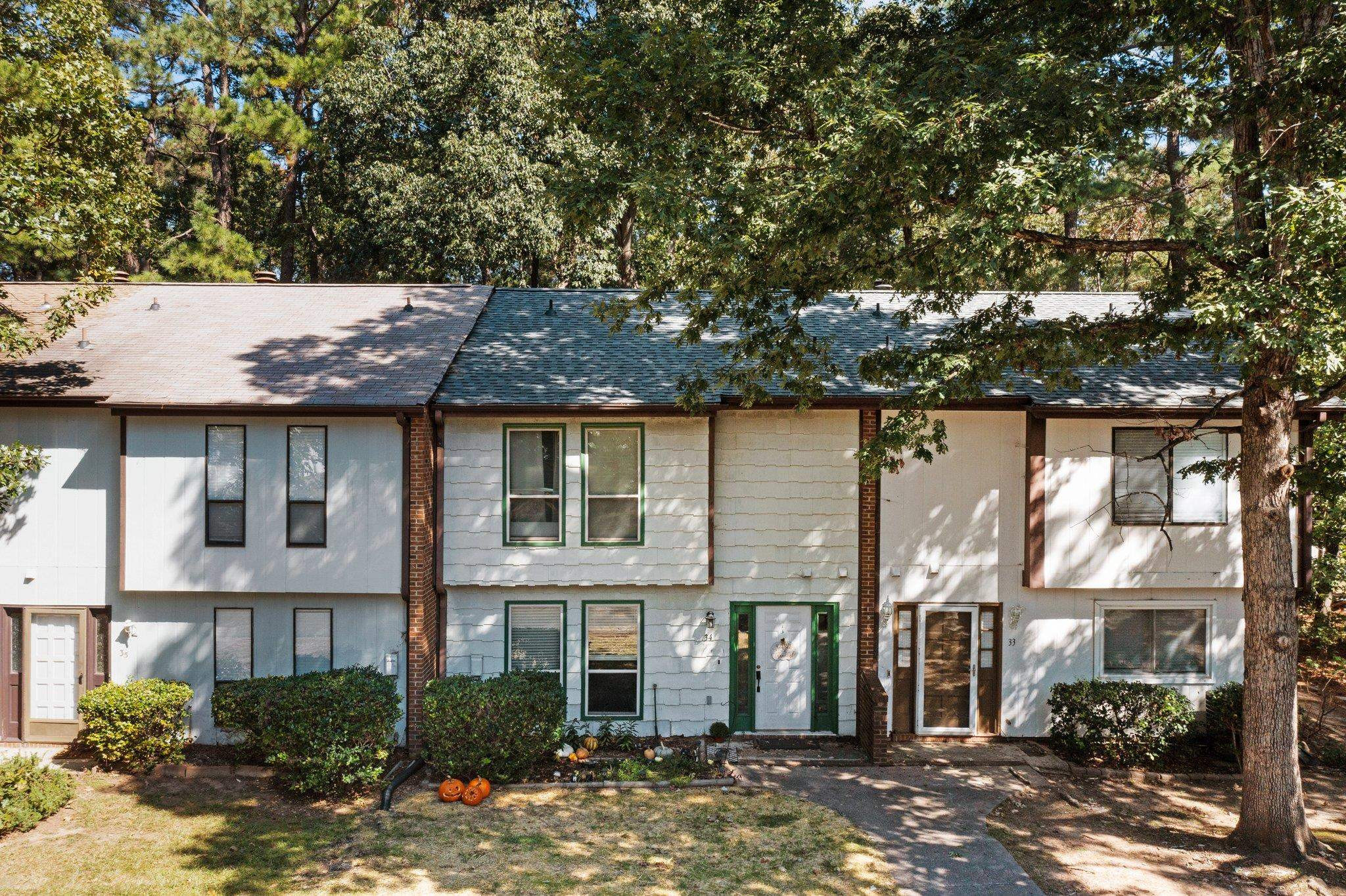 1227 Seaton Road, Unit 34 Durham, NC 27713 - Photo 28 of 32 a view of a big yard in front of a house