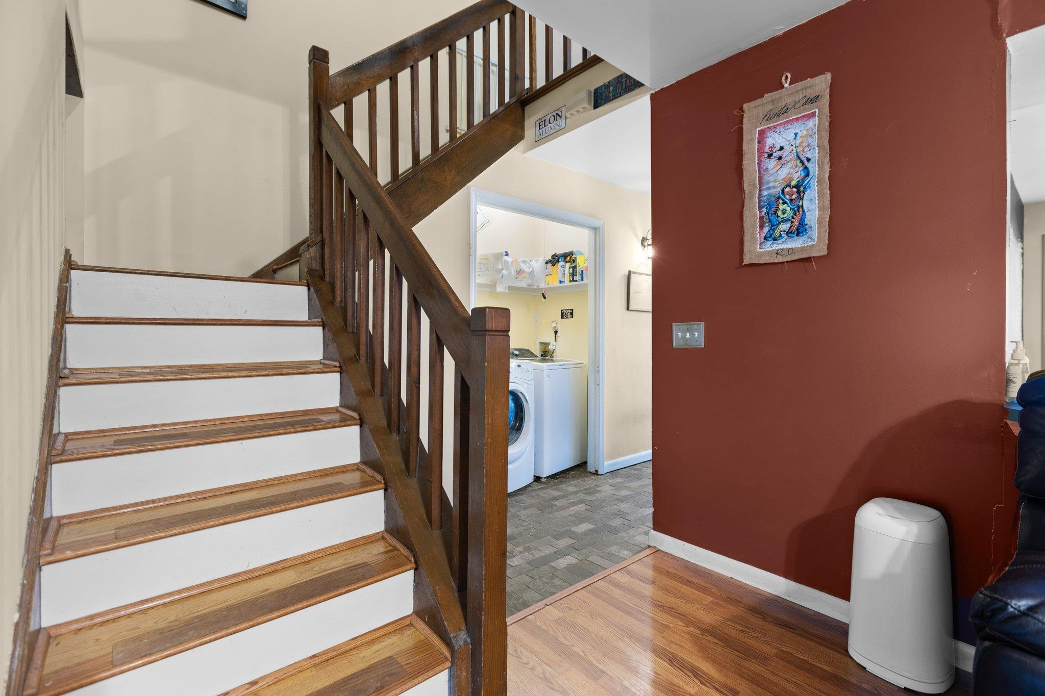 1227 Seaton Road, Unit 34 Durham, NC 27713 - Photo 7 of 32 a view of entryway and hall with wooden floor