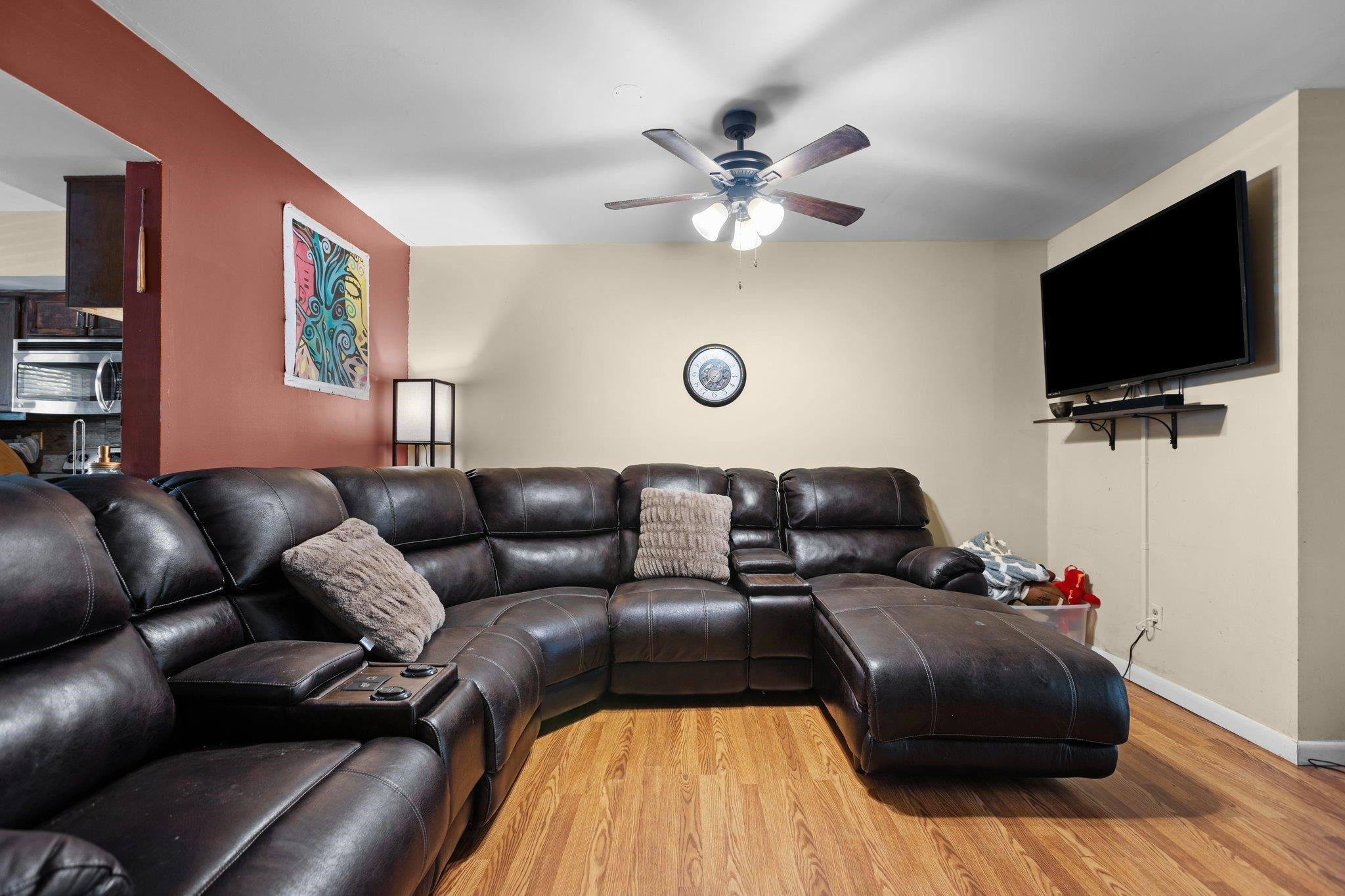 1227 Seaton Road, Unit 34 Durham, NC 27713 - Photo 8 of 32 a living room with furniture and a flat screen tv