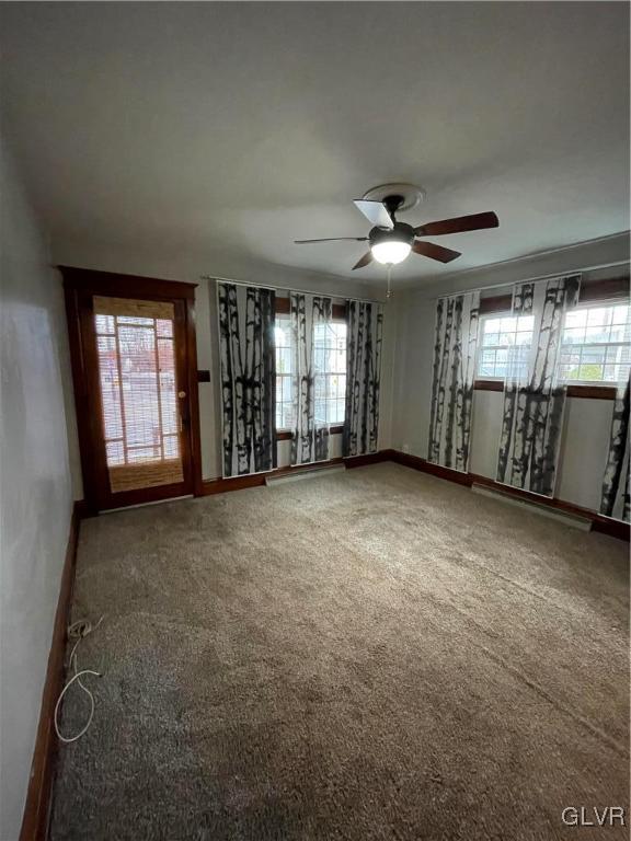 258 Nazareth Pike Bethlehem, PA 18020 - Photo 8 of 19 an empty room with chandelier fan and windows