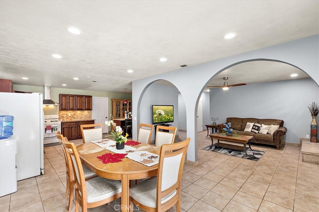 2914 West Wilson Street Banning, CA 92220 - Photo 6 of 31 a living room with furniture and a wooden floor