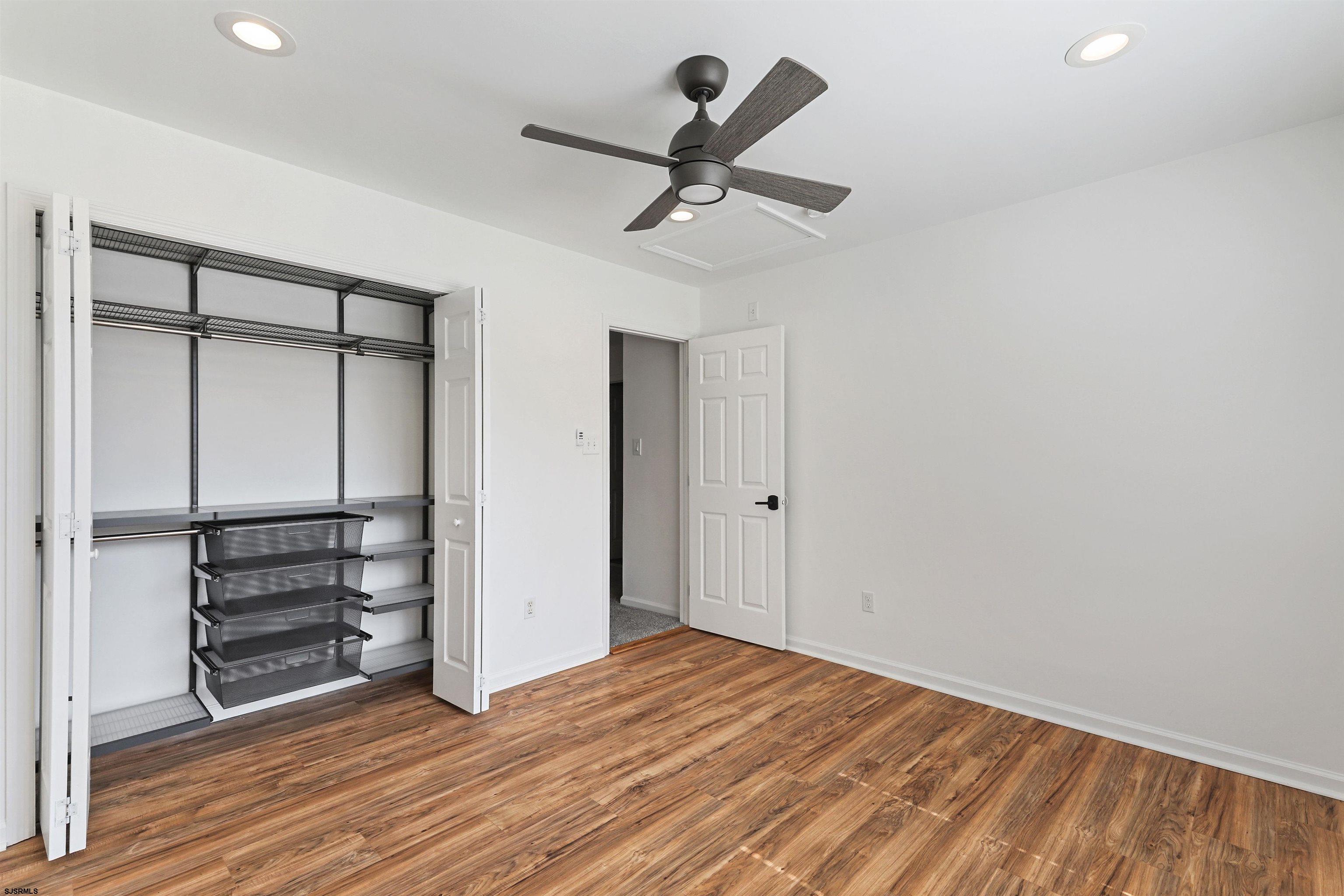 34 Kay Drive Hammonton, NJ 08037 - Photo 14 of 23 a view of empty room with wooden floor and ceiling fan