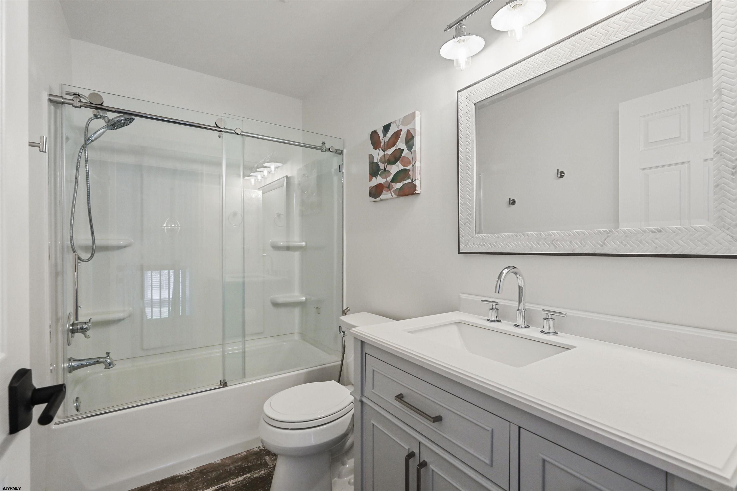 34 Kay Drive Hammonton, NJ 08037 - Photo 18 of 23 a bathroom with a sink toilet and shower