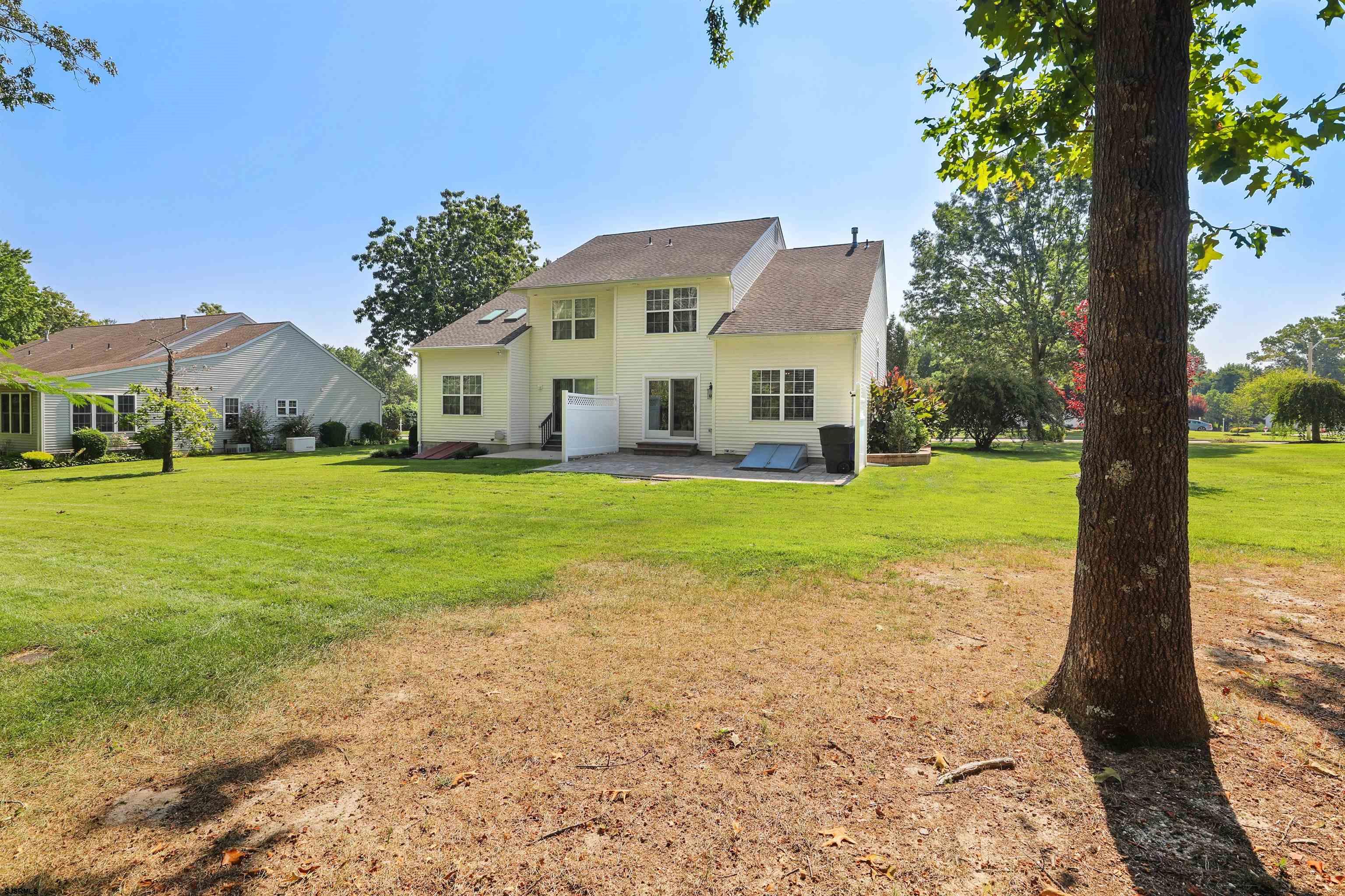 34 Kay Drive Hammonton, NJ 08037 - Photo 23 of 23 a large house with a big yard and large trees
