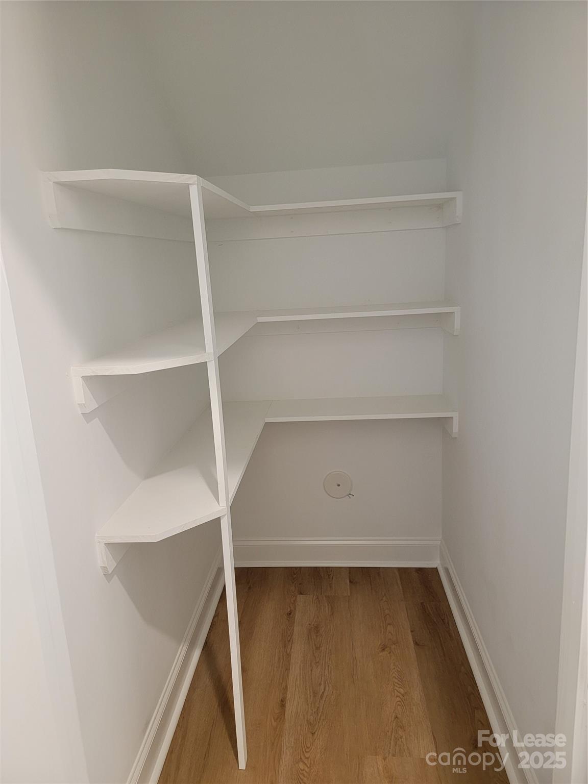 Undisclosed Address Waxhaw, NC 28173 - Photo 12 of 22 a view of an empty walk in closet