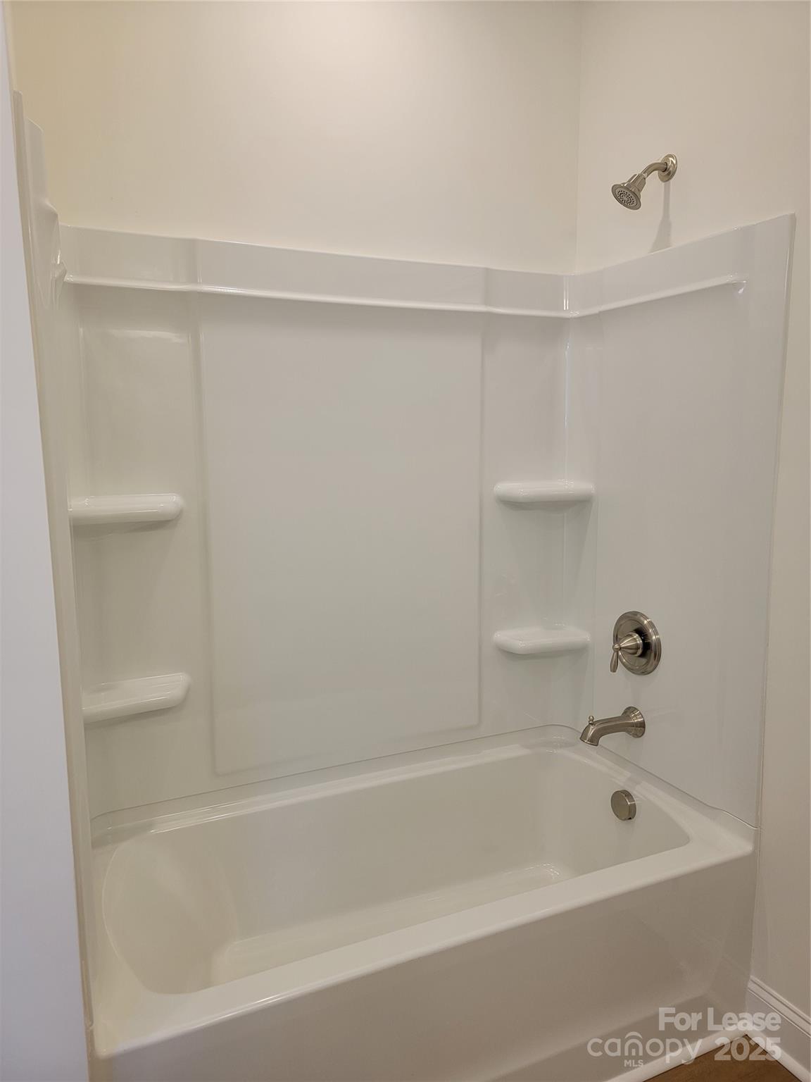 Undisclosed Address Waxhaw, NC 28173 - Photo 15 of 22 a bathroom with bathtub