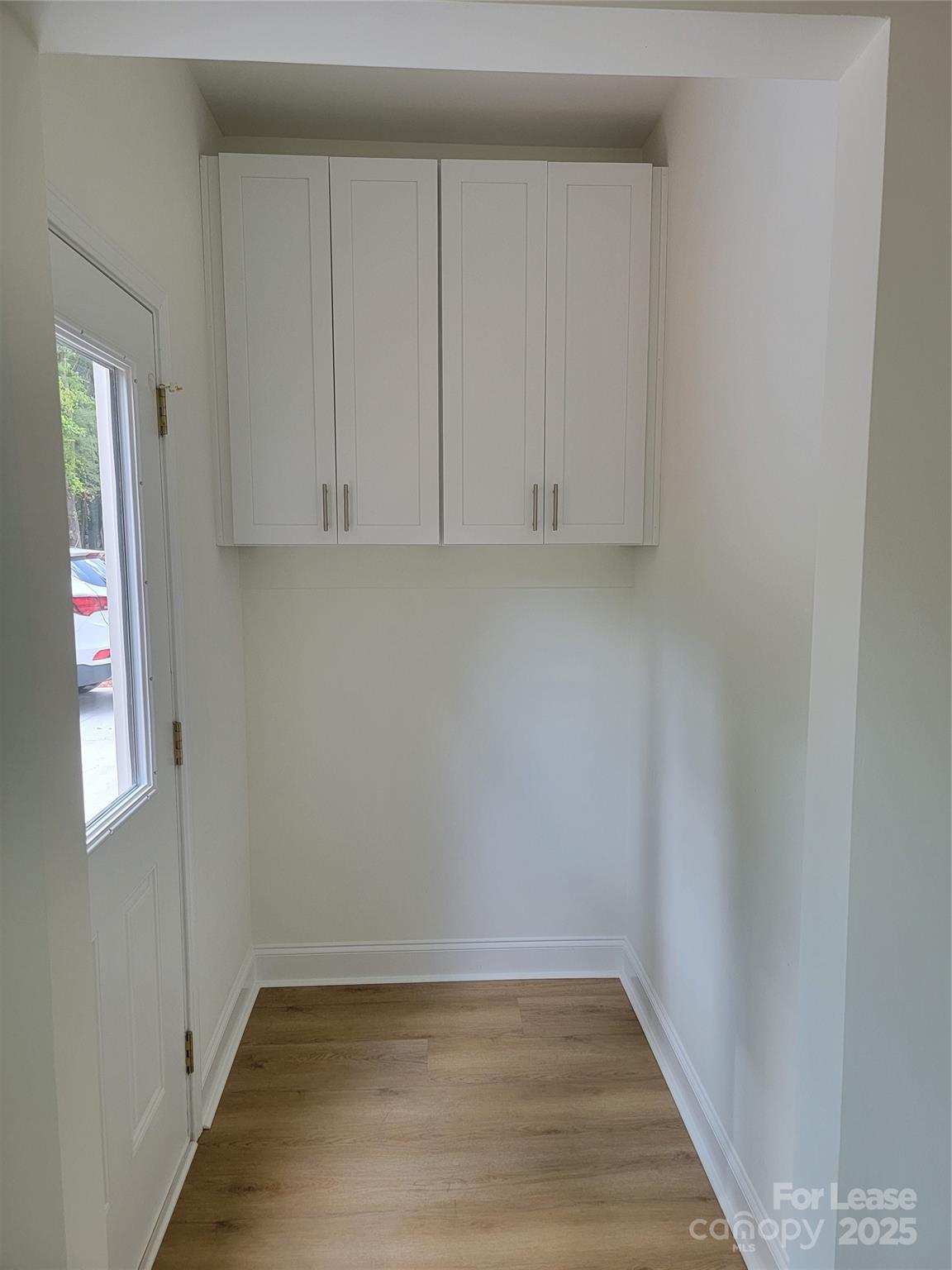 Undisclosed Address Waxhaw, NC 28173 - Photo 18 of 22 a view of an empty room with closet and a window