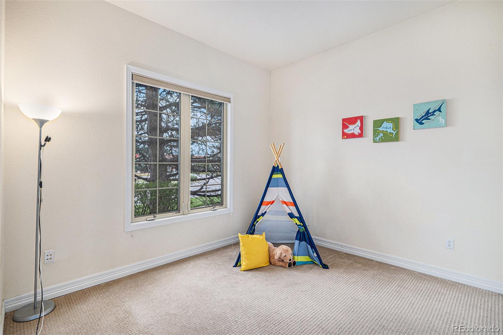 529 Uinta Way Denver, CO 80230 - Photo 15 of 37 a room with a window and couch