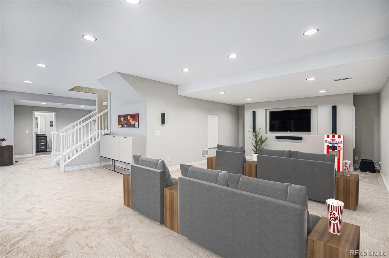 529 Uinta Way Denver, CO 80230 - Photo 20 of 37 a living room with furniture and a flat screen tv