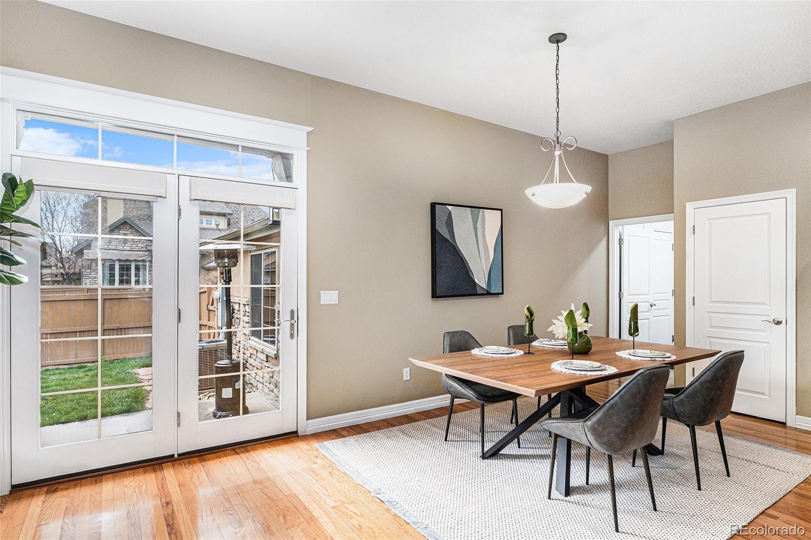 529 Uinta Way Denver, CO 80230 - Photo 5 of 37 a view of a dining room with furniture window and outside view