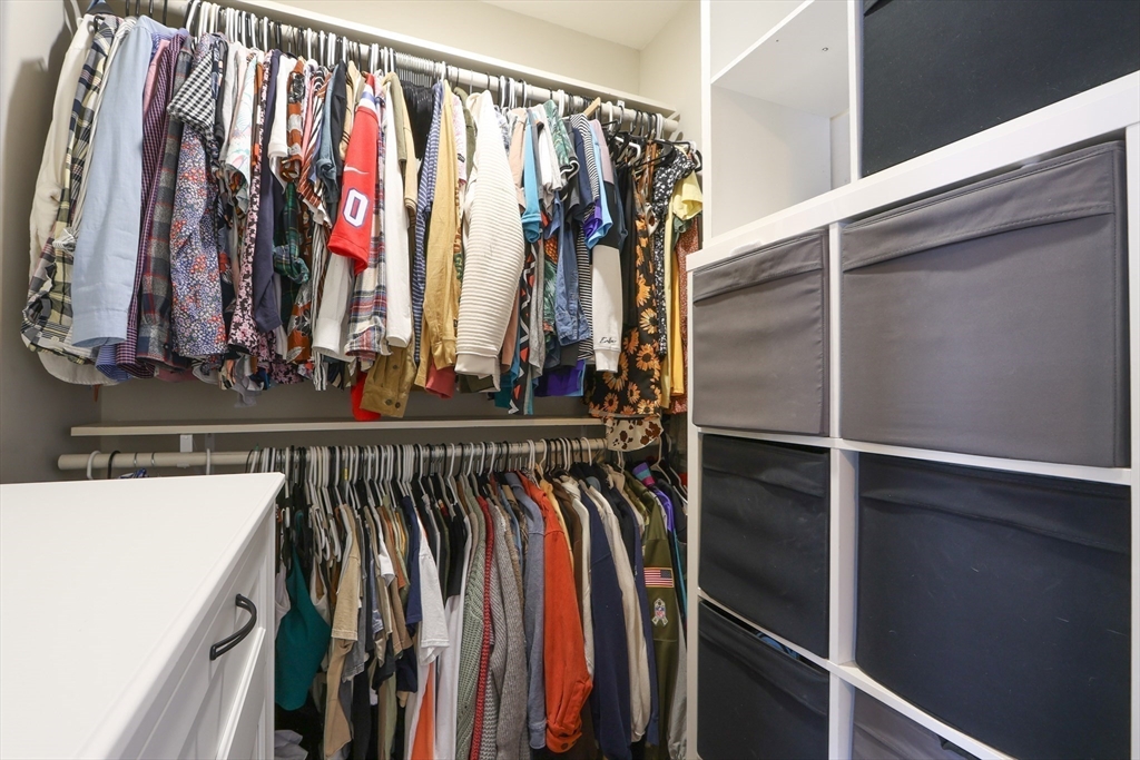 96 Brantwood Road Worcester, MA 01602 - Photo 15 of 33 a view of walk in closet with clothes and shoes