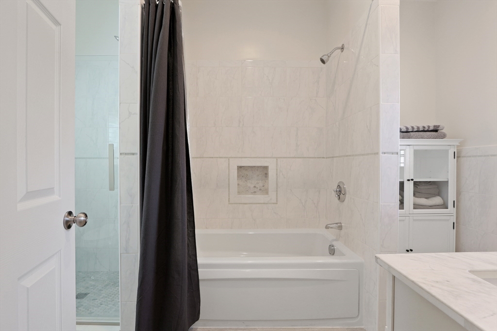 96 Brantwood Road Worcester, MA 01602 - Photo 17 of 33 a bathroom with a bathtub and a sink