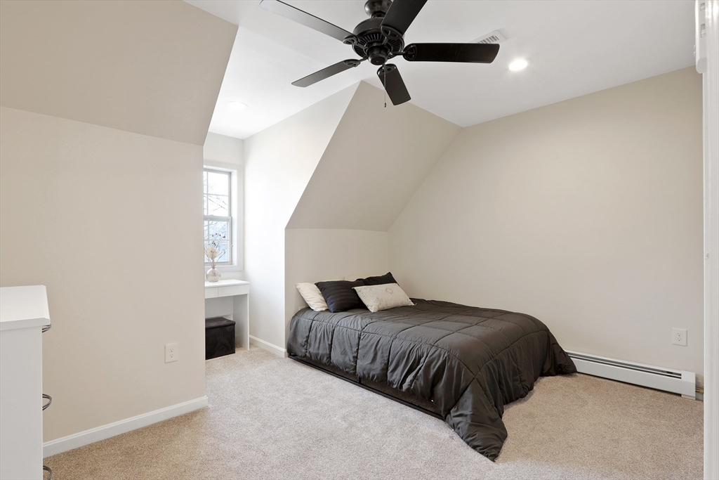 96 Brantwood Road Worcester, MA 01602 - Photo 21 of 33 a bedroom with a bed and window