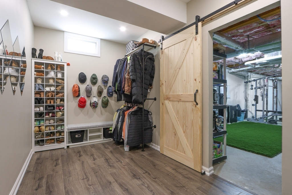 96 Brantwood Road Worcester, MA 01602 - Photo 24 of 33 a view of walk in closet with clothes and shoes