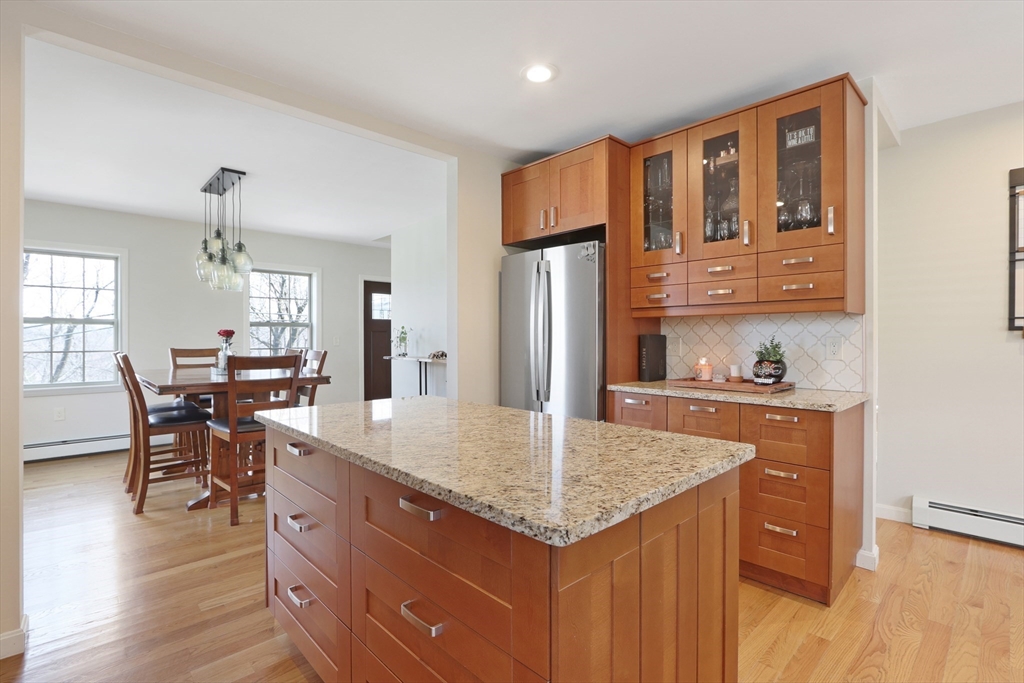 96 Brantwood Road Worcester, MA 01602 - Photo 4 of 33 a kitchen with stainless steel appliances granite countertop a kitchen island a stove and a sink