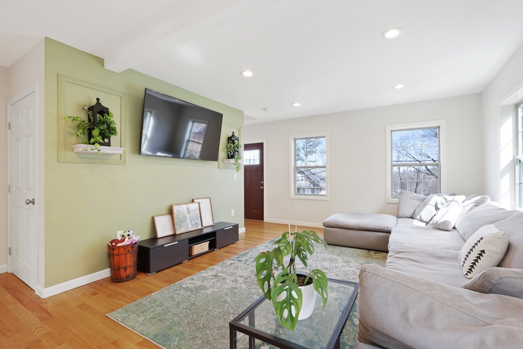 96 Brantwood Road Worcester, MA 01602 - Photo 9 of 33 a living room with furniture and a wooden floor