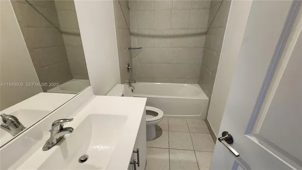 a bathroom with a bathtub