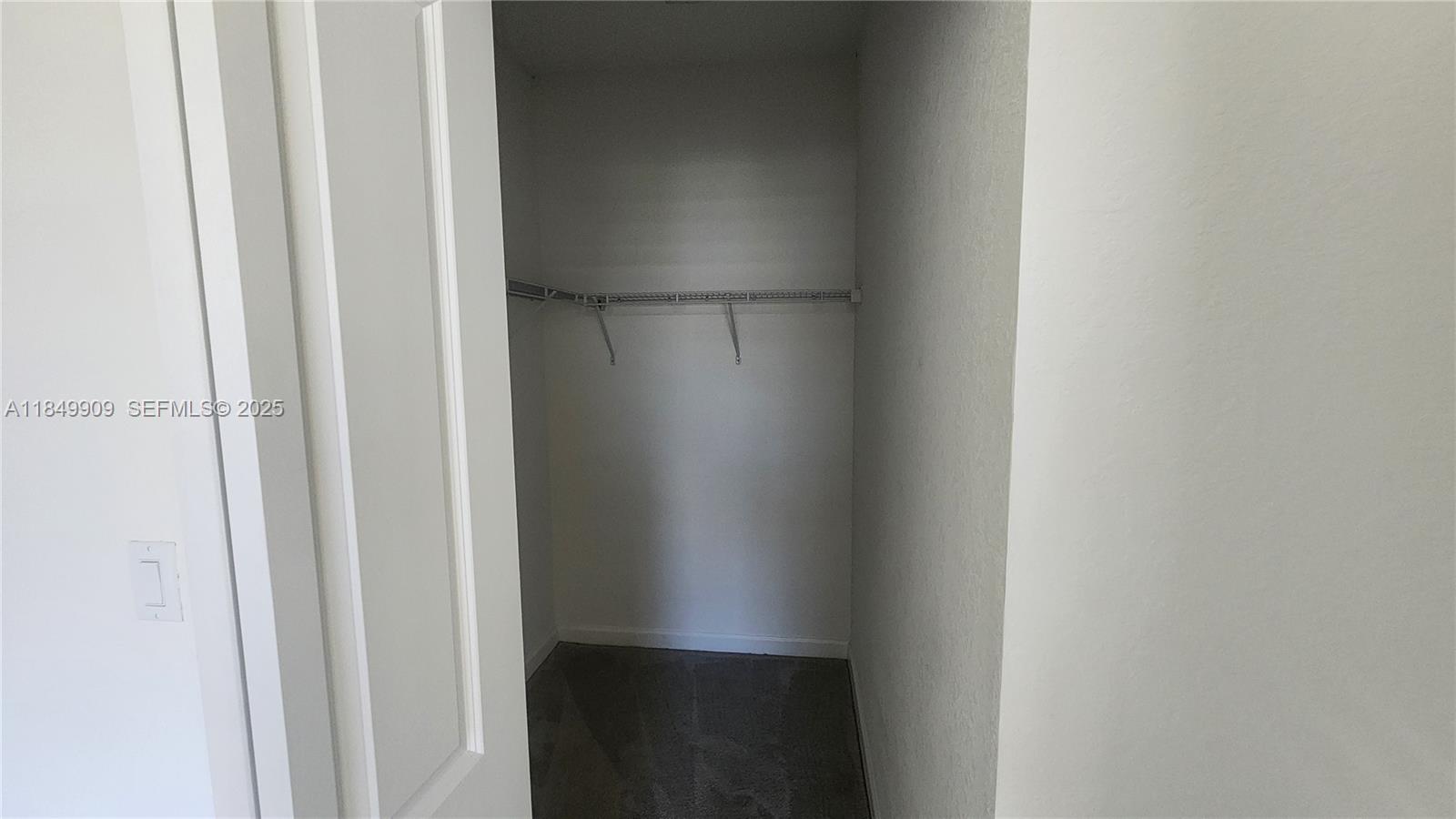 12897 Southwest 234th Street, Unit 12897 Homestead, FL 33032 - Photo 22 of 24 a view of closet